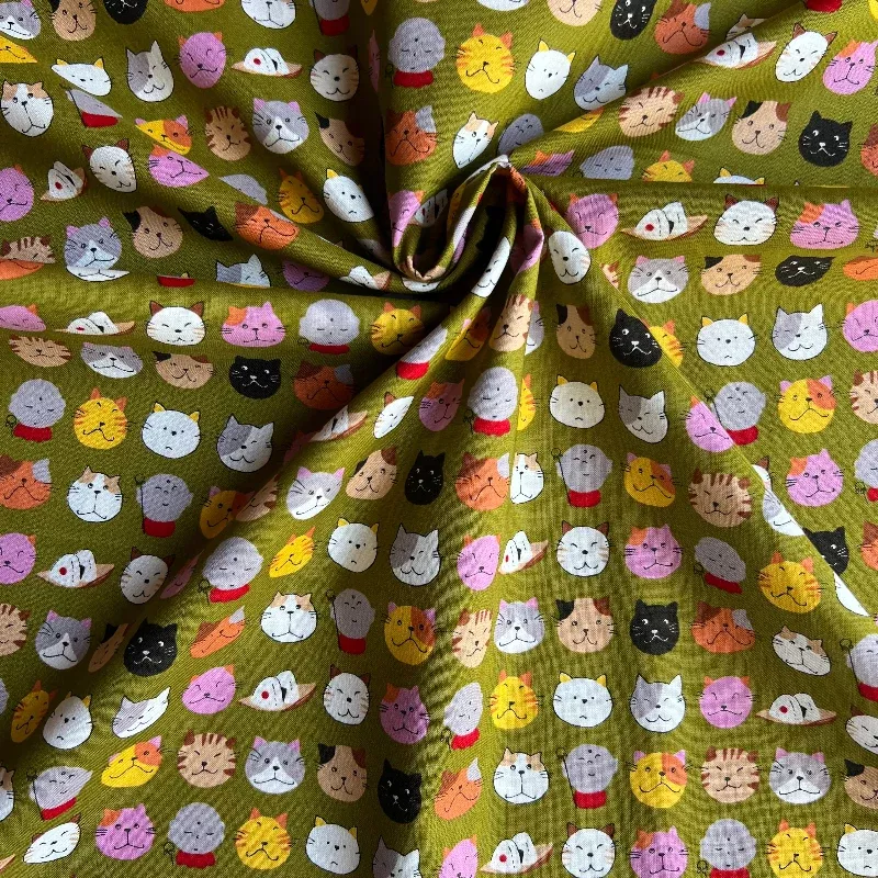Asano - Cotton Sheeting - Smiling Cat Faces on Moss